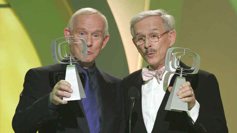 Tom and Dick Smothers with awards