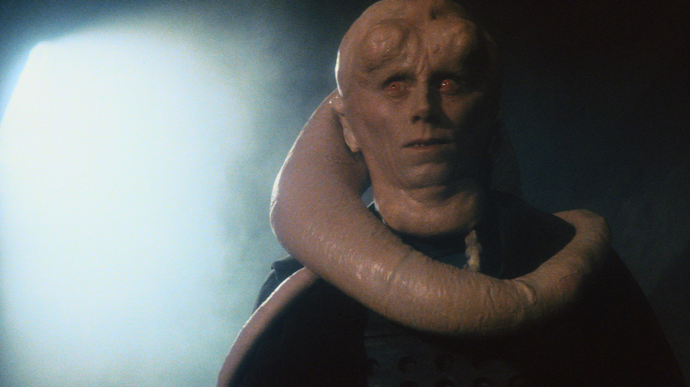 Bib Fortuna greets droids at Jabba's Palace