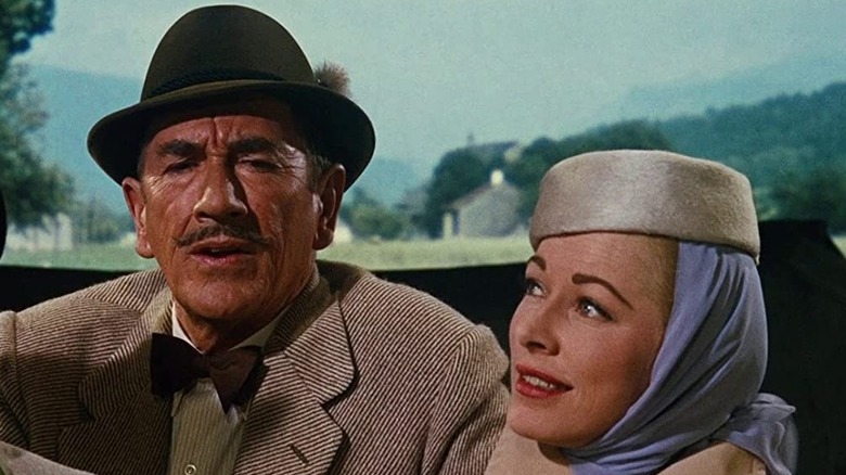 Richard Haydn and Eleanor Parker riding in a car