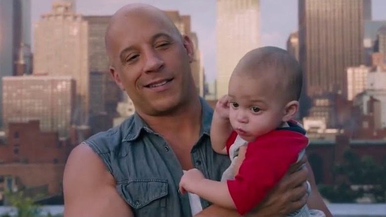 Dominic Toretto and baby Brian smiling