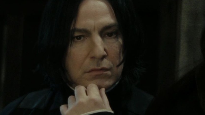 Snape with hand on chin