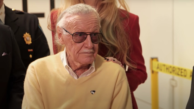 Stan Lee smiles with glasses