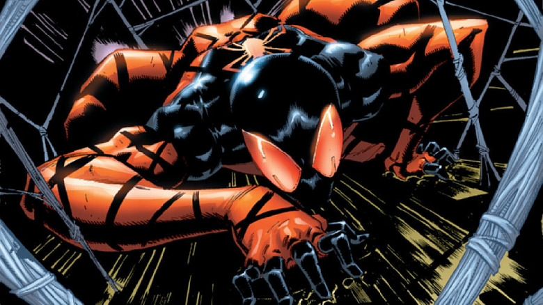 Scarlet Spider Kaine crawls on web