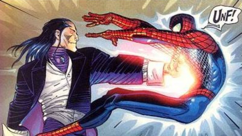 Morlun punching Spider-Man in the chest