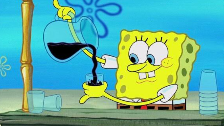 SpongeBob pouring ink into a glass