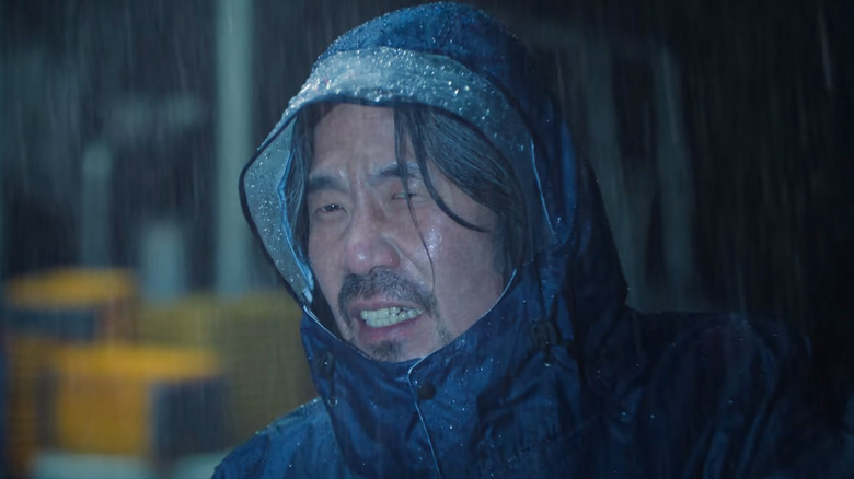 Captain Park acts innocent after he's committed murder in "Squid Game" Season 2