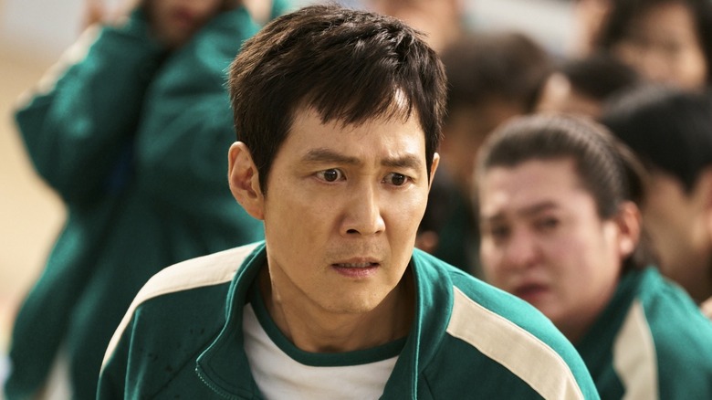 Gi-hun looks concerned in "Squid Game" Season 2 (2024)