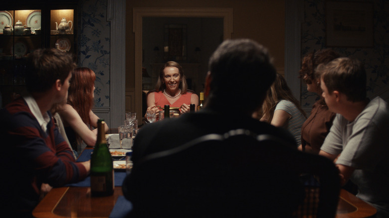 The Peterson family sitting around a table