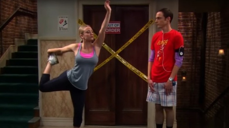 Kaley Cuoco and Jim Parsons by the stairs