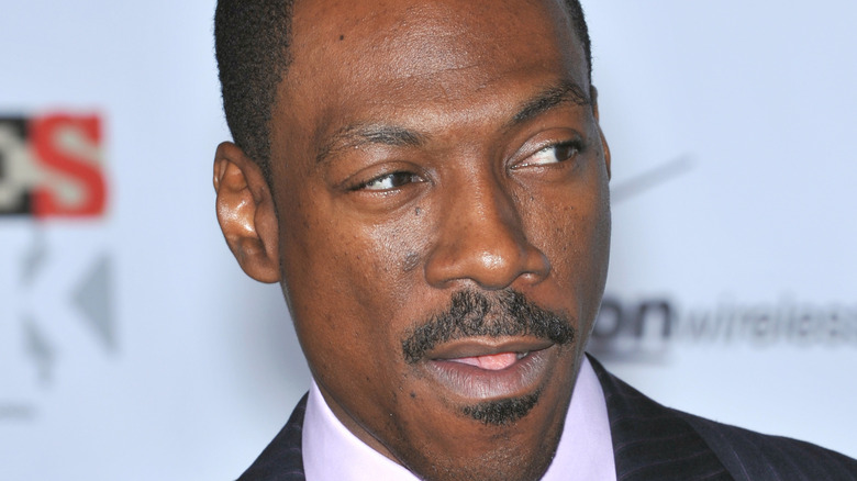 Eddie Murphy looking to his side