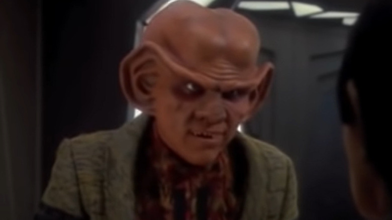 Quark speaking passionately to Vulcan