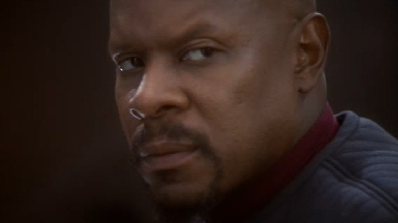 Benjamin Sisko looking over shoulder