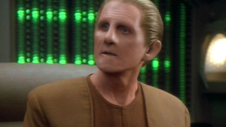 Odo looks on intently