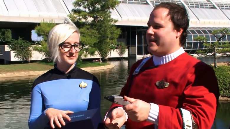 Trekkies admiring a phaser