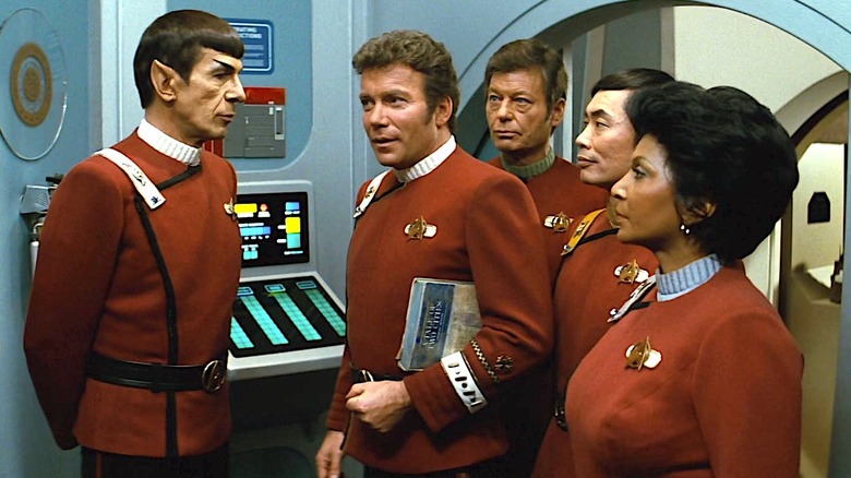 Capt. Kirk talking to crew