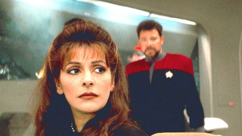 Troi looking alarmed