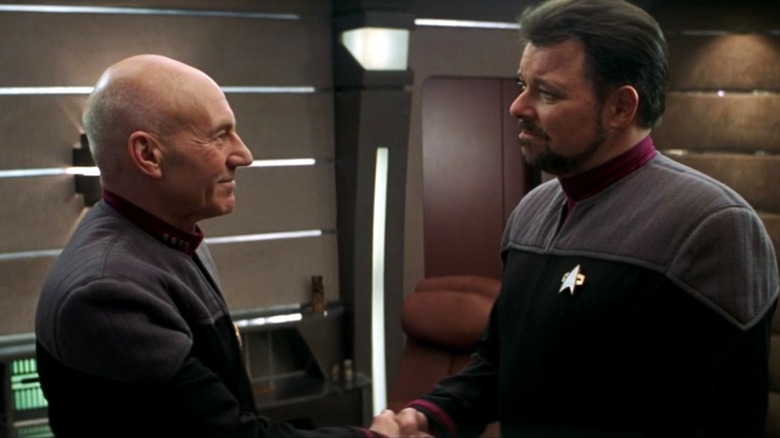 Picard shakes Riker's hand