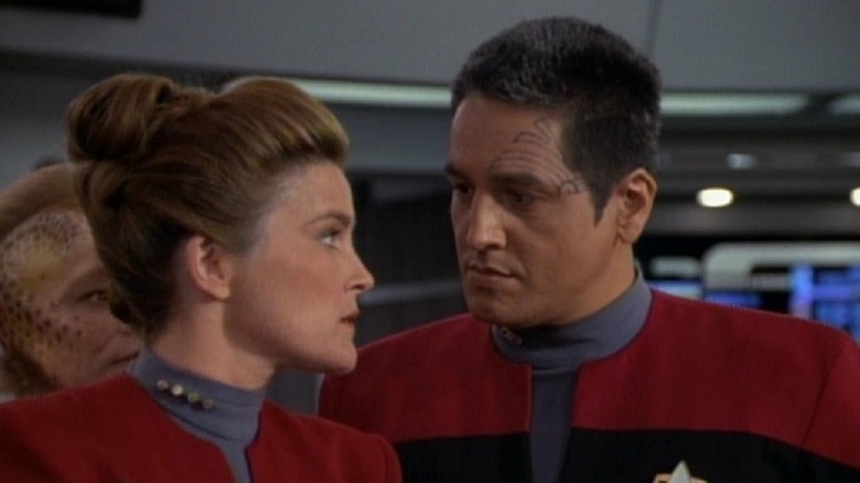 Chakotay looks at Janeway