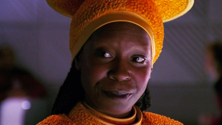 Guinan tends bar and she listens