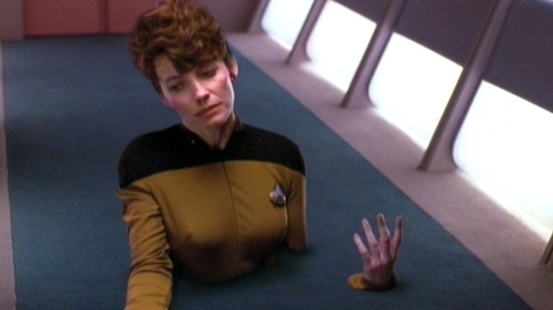 Lieutenant Van Mayter's body phased through the floor of the Enterprise-D