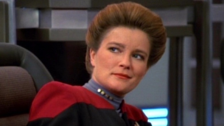 Star Trek: Voyager Captain Janeway smirks