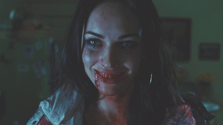 Jennifer grinning with bloody mouth