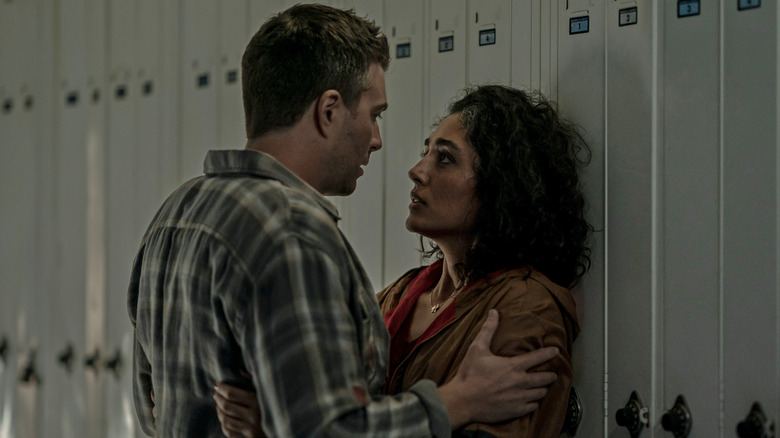 Annesha and friend against lockers