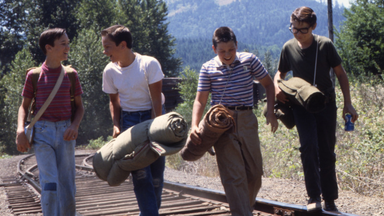 The kids walking the tracks