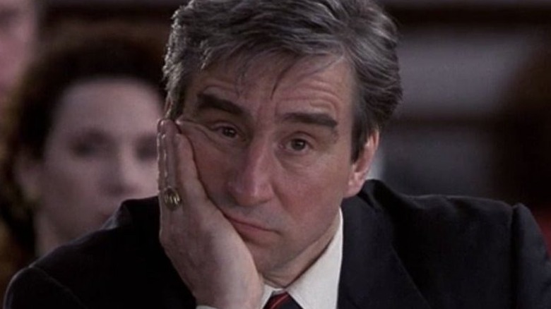 Jack McCoy leaning into hand