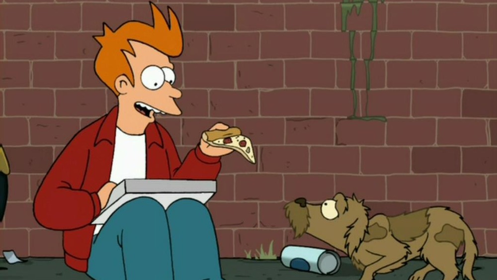 Fry feeds his dog pizza