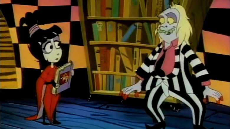 Lydia and Beetlejuice with bookshelf