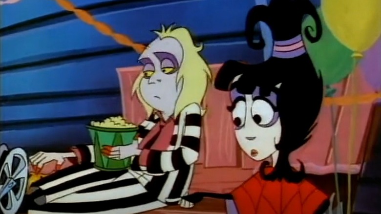 Beetlejuice and Lydia watch TV