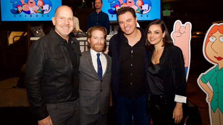 Kunis poses with Family Guy cast