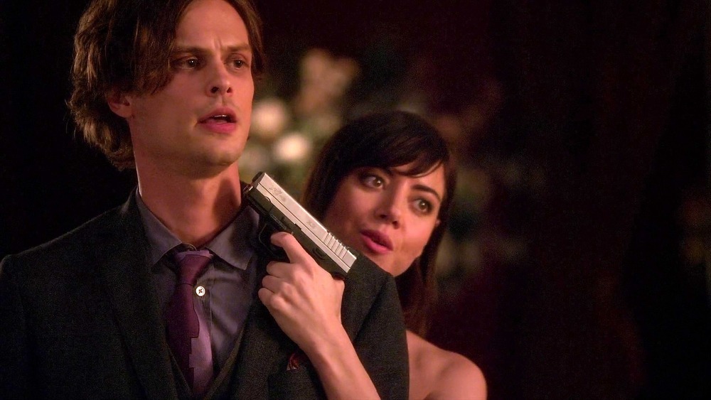 Cat Adams holding Spencer Reid at gunpoint on Criminal Minds