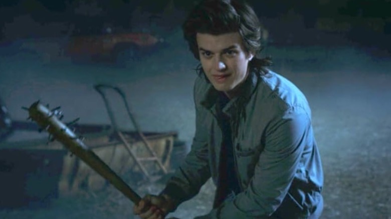 Steve Harrington swings bat