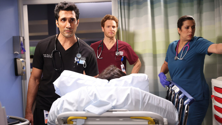 Dr. Marcel moving patient on Chicago Med