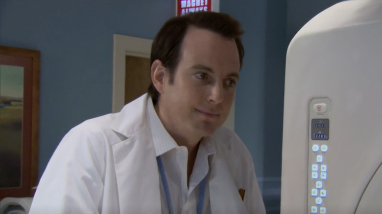 Will Arnett as Chris wearing a lab coat