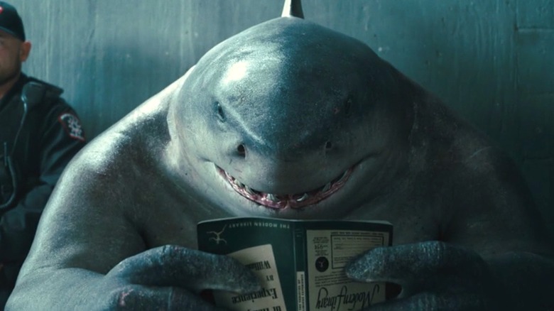 King Shark reads a book