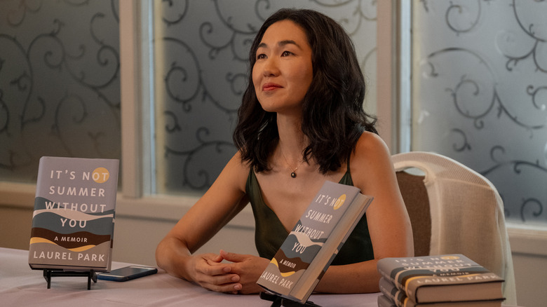 Laurel smiles at a book signing