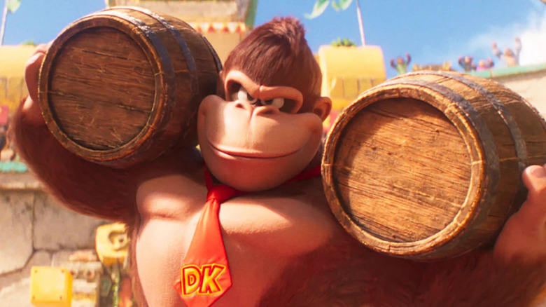 Donkey Kong lifting two barrels