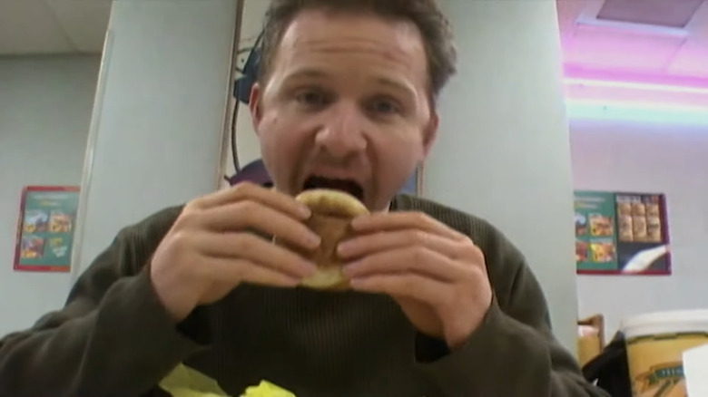 Morgan Spurlock eating burger