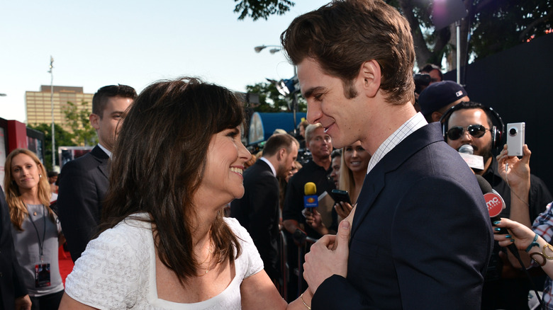 Sally Field and Andrew Garfield smiling at each other