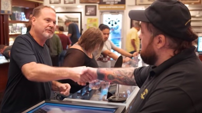 James and Chumlee shaking hands