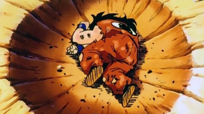 Yamcha curled dead in a crater in "Dragon Ball Z"