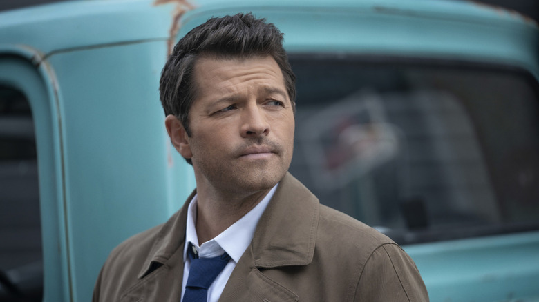 Castiel next to blue truck