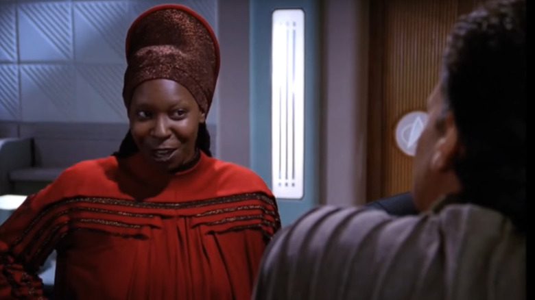 Guinan talks with Q in Star Trek: The Next Generation