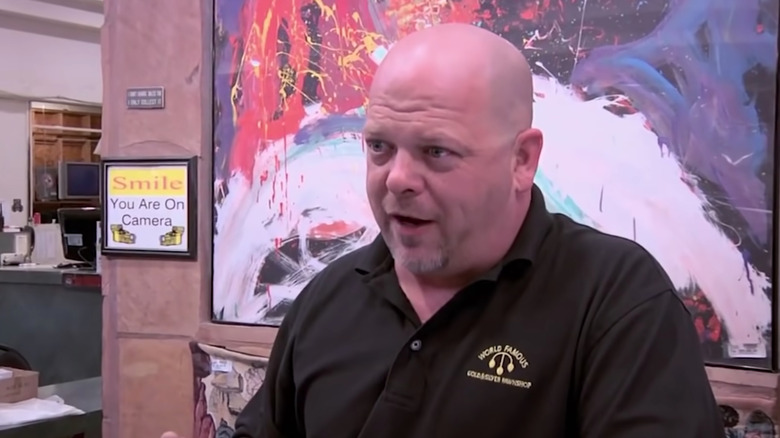 Rick Harrison talks to customer