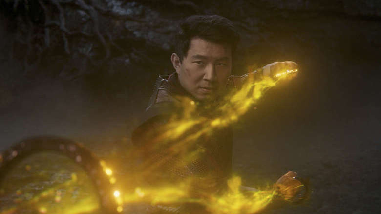 Shang-Chi holding the ten rings