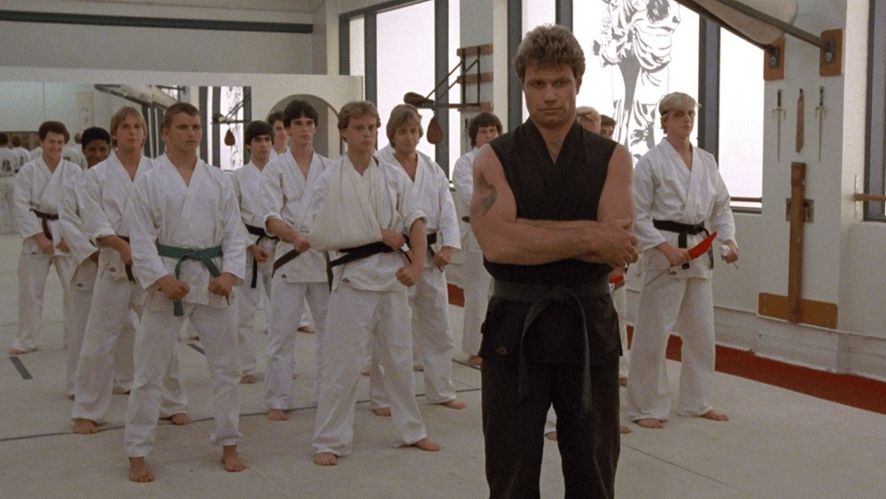 John Kreese and his Cobra Kai students