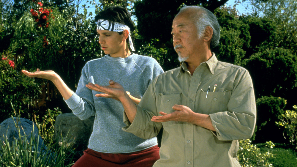 Daniel LaRusso and Mr. Miyagi training